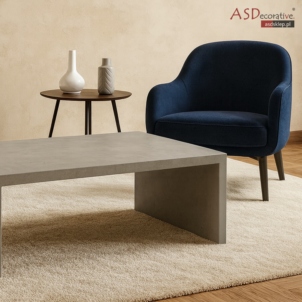 Zabudowa meblowa wykończona mikrocementem o jednolitej strukturze i stonowanej kolorystyce. Meble z mikrocementu tworzą nowoczesną, minimalistyczną formę bez widocznych łączeń.